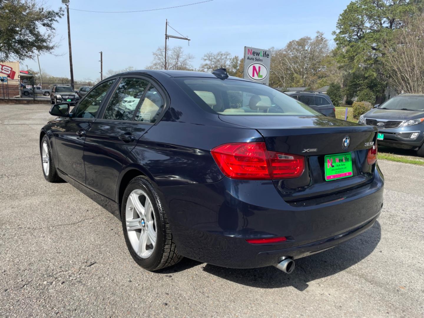 2014 BLUE BMW 3 SERIES 320I XDRIVE (WBA3C3G54EN) with an 2.0L engine, Automatic transmission, located at 5103 Dorchester Rd., Charleston, SC, 29418-5607, (843) 767-1122, 36.245171, -115.228050 - Photo#4